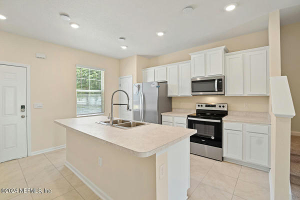 592 RUNNING WOODS ST, ORANGE PARK, FL 32065, photo 4 of 20